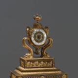 Flötenuhr aus dem Geymüllerschlössel in Wien. Stutzuhr (attr. Peter Rau), mit Bronzen von Franz Detler (1810–1820). MAK – Museum für angewandte Kunst, BR 1608
