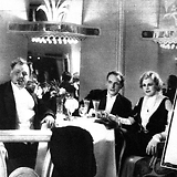 Wiener Bilder, 13.8.1933, 8 (in Großfürstin Alexandra [l.], mit Johann Riemann und M. Jeritza)